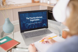 Woman using laptop to access online learning